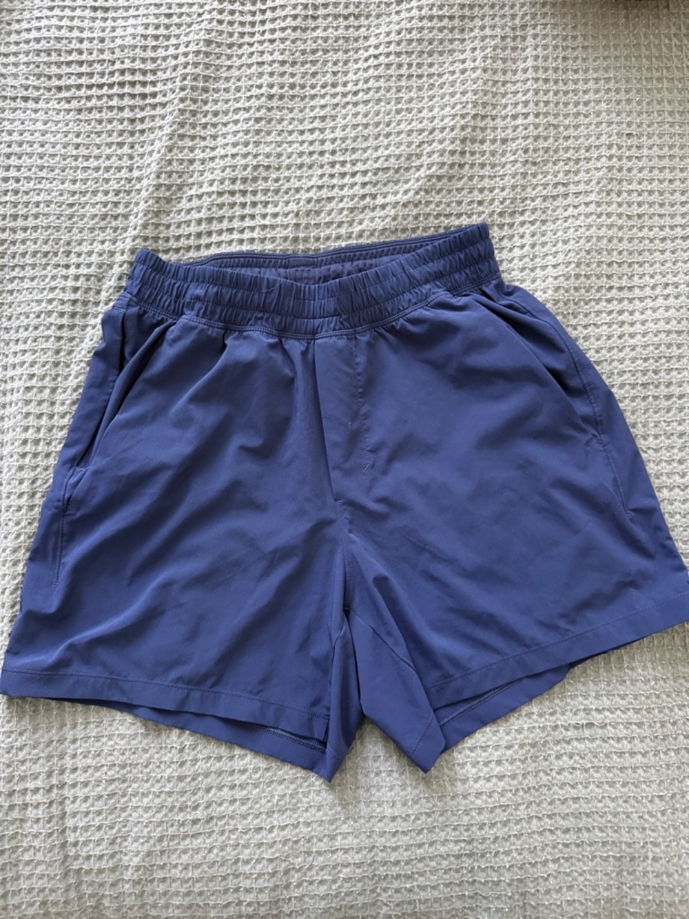 Lululemon athletica small navy blue performance shorts (5 inch inseam)